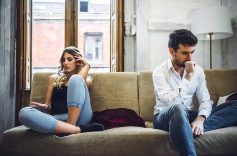 unhappy-divorcing-couple-on-couch